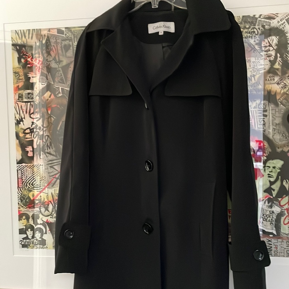 Black Calvin Klein rain coat.